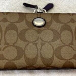 Coach Peyton Signature "C" Canvas Long Wallet with violet interior and trim